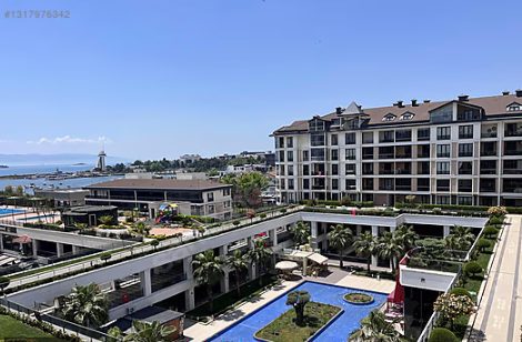 Tuzla Port Sitesi Deniz Manzaralı Ebeveyn Banyolu ,Balkonlu 2+1 Daire